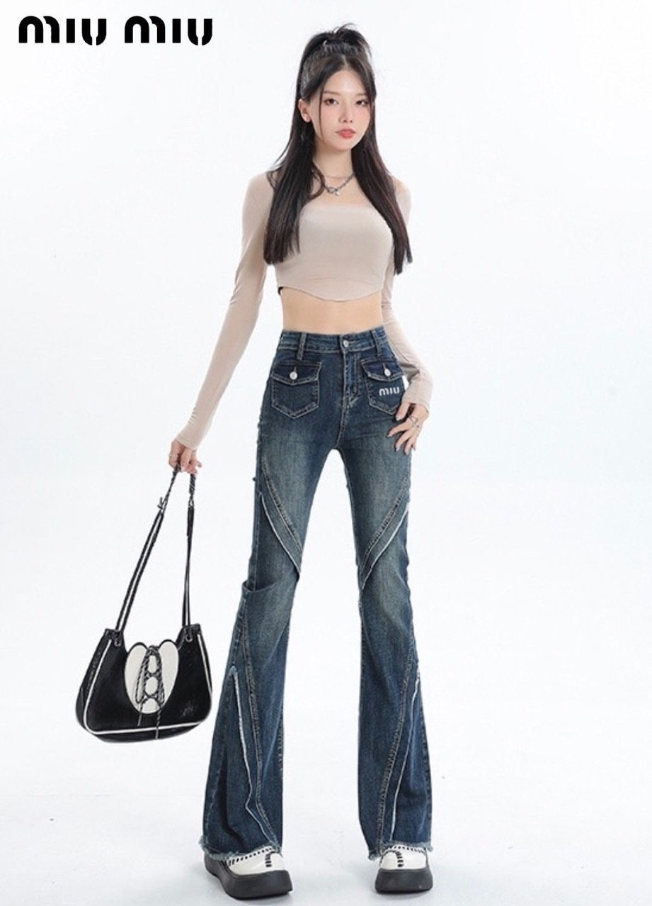 💕 미*** 로고 절개 부츠컷 데님 팬츠